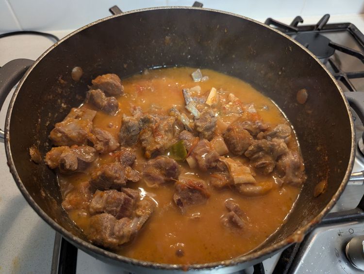 Step 1.1: Once the meat is tender, remove the lid and let the water evaporate until you are left with a thick and flavorful karahi