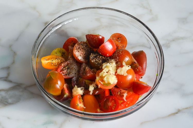 Step 1.1: In a medium bowl, combine the tomatoes, garlic, vinegar, salt, and pepper