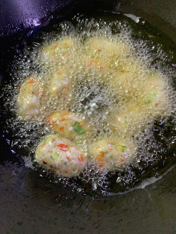 Step 1.1: Heat oil in a pan and deep fry the kofta balls till they turn golden brown