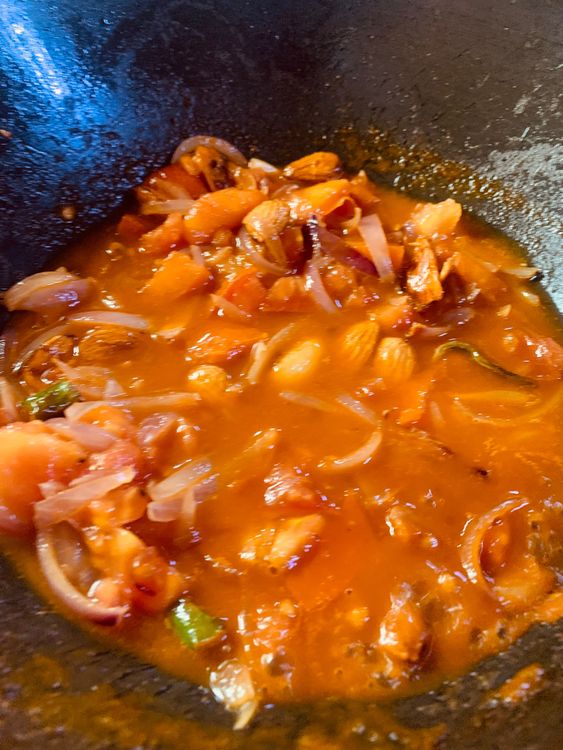 Step 2.2: Add chopped tomatoes and tomato puree, mix nicely, and saute for 2-3 minutes