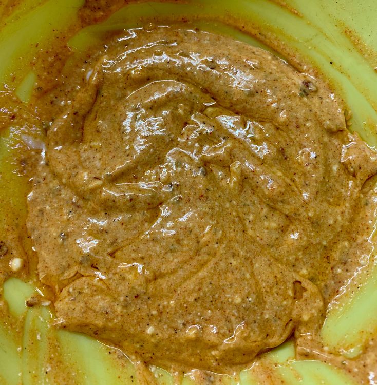 Step 1.1: Mix curd, lemon juice, vinegar, 1 tbsp of oil, garlic paste, peri seasoning, red chilli powder, and salt in a small bowl