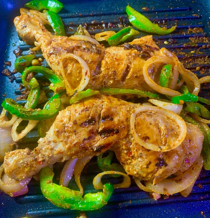 Step 1.1: Place the grilled chicken in the pan and toss them together for 1-2 minutes