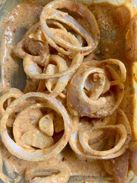 Step 1.1: Until then marinate onion rings with the left marinade in the bowl and keep it aside
