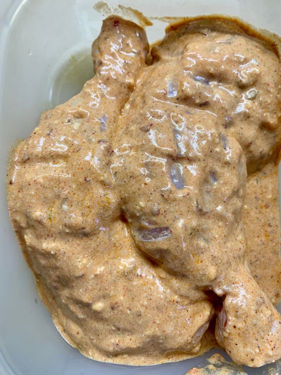 Step 1.2: Place the chicken in a shallow dish bowl and pour the peri mixture over them