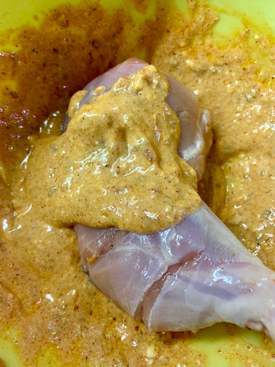 Step 1.1: Place the chicken in a shallow dish bowl and pour the peri mixture over them