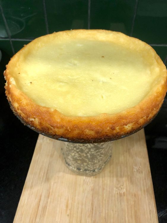 Step 6.1: Once the cheesecake has chilled, run a blunt butter knife along the sides and release it from the springform pan
