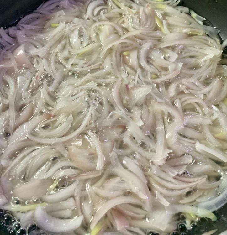Step 2.2: Reduce the heat to medium and add diced onions