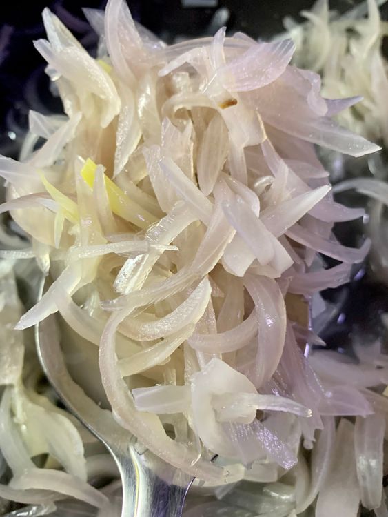 Step 2.3: Reduce the heat to medium and add diced onions