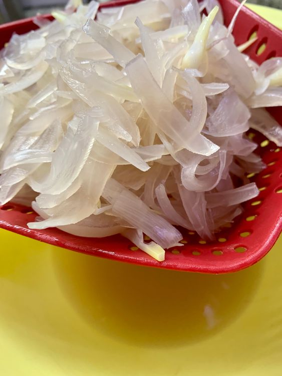 Step 2.1: Strain and save the leftover water from the onions