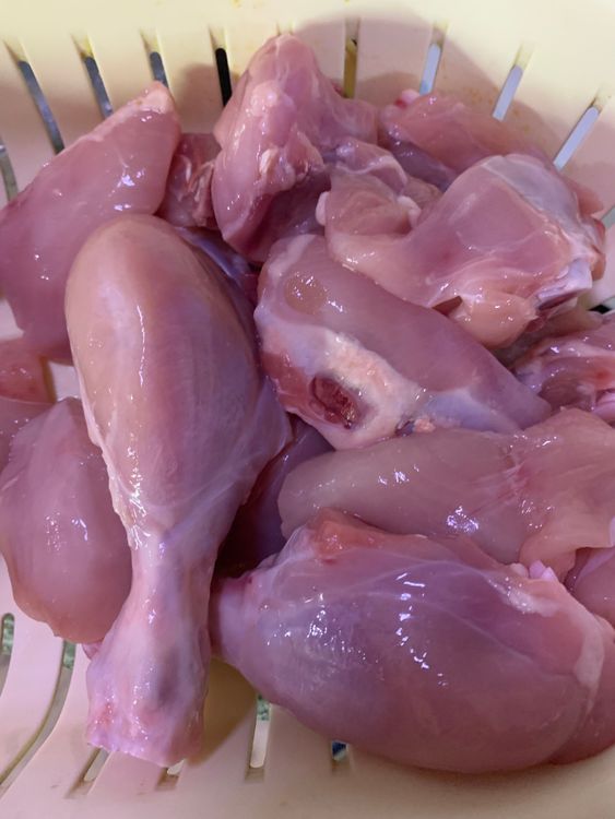 Step 1.1: Wash the chicken pieces and drain the excess water