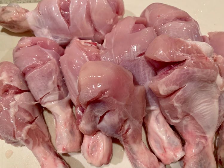 Step 1.1: Cut slits into chicken drumsticks