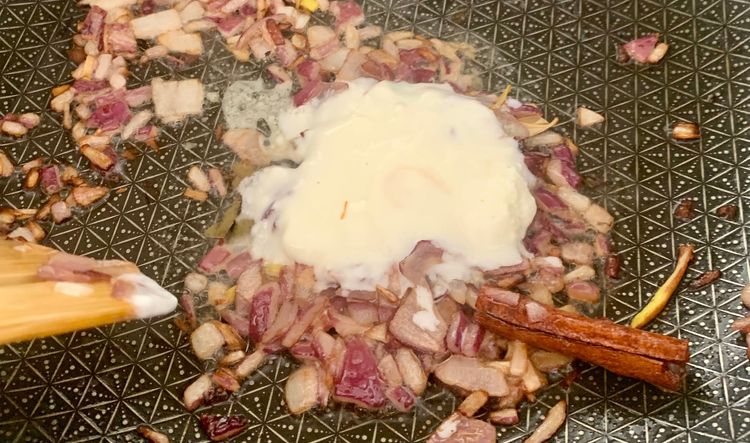 Step 3.1: Add 1tbsp of yogurt/curd and cook for 2 minutes while stirring constantly