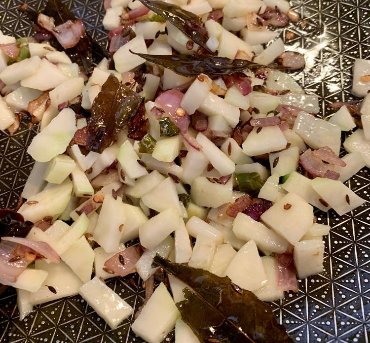 Step 2.1: Add the chopped potatoes and salt