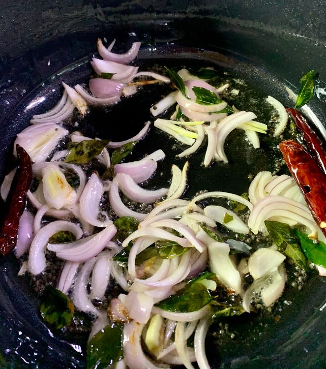 Step 3.1: Add sliced onions and saute for 2-3 minutes till translucent and light pink in colour