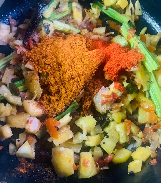 Step 3.1: Now add sambhar powder, desiccated coconut (optional), red chilli powder, kashmiri red chilli powder and salt