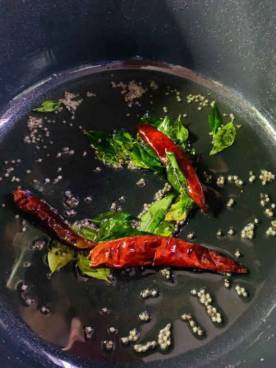 Step 3.1: Add dry red chillies, curry leaves and black mustard seeds