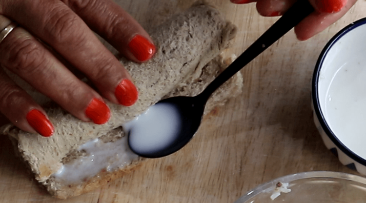 Step 3.1: Gently roll the bread slice around the filling, forming a tight roll