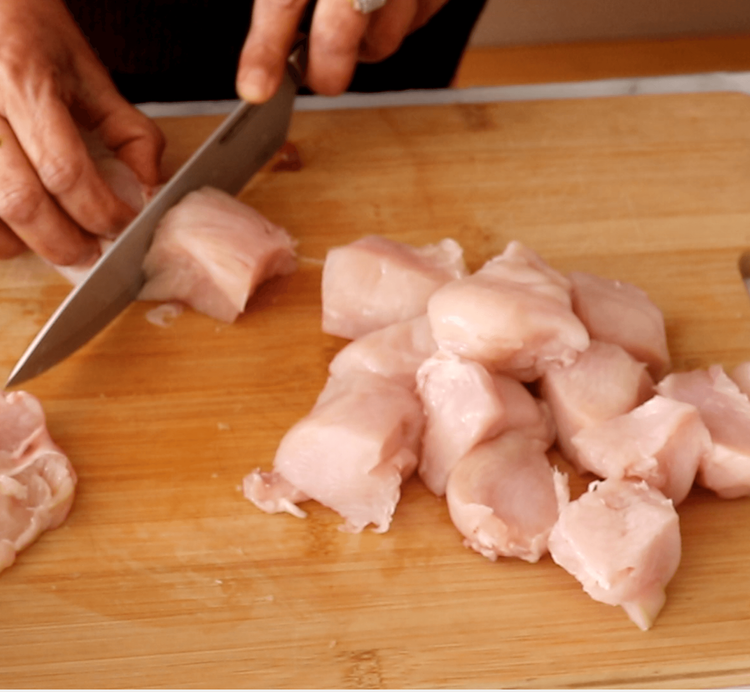Step 1.1: Wash the chicken breasts thoroughly, pat dry, and cut them into 1-inch cubes