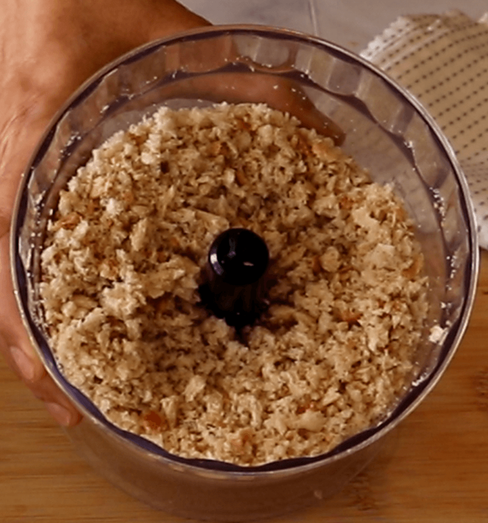 Step 1.1: Tear the bread slices into small pieces and pulse them in a blender to make fine crumbs