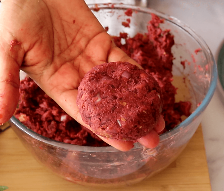 Step 2.1: Lightly grease your palms with oil or water