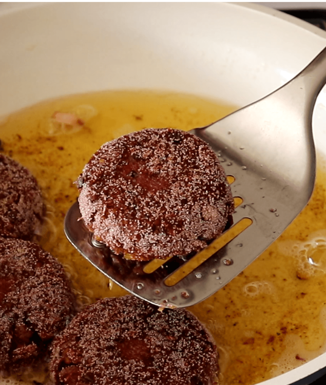 Step 3.1: Remove the cutlets using a slotted spoon and place them on a paper-lined plate to absorb excess oil