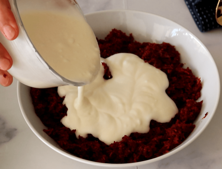 Step 2.1: Once cooled, add the whisked yogurt and mix until smooth