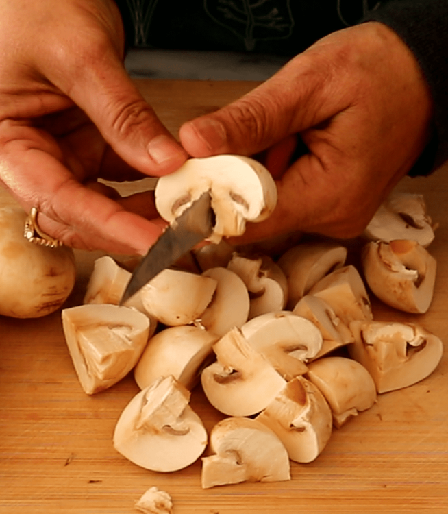 Step 1.1: Rinse the mushrooms thoroughly, pat them dry, and cut them into halves or quarters, depending on their size