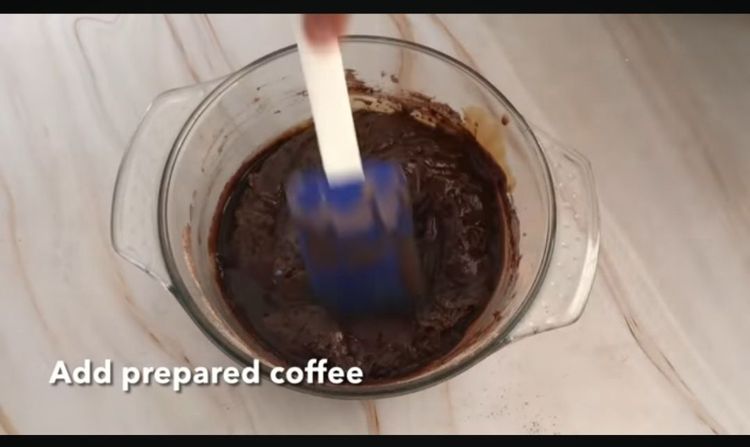 Step 1.1: In a large mixing bowl, combine cocoa powder and milk