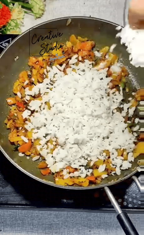 Step 1.1: Add the washed poha to the pan and cook, stirring occasionally, until it becomes slightly crisp and golden brown