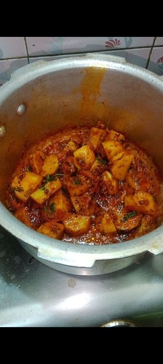 Step 1.3: Once the potatoes are well coated, add 1 cup of water, add 1 tsp sugar let it simmer for few minutes