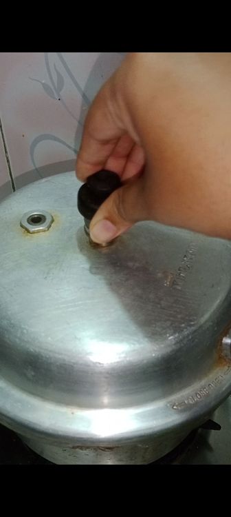Step 1.1: Once the potatoes are well coated, add 1 cup of water, add 1 tsp sugar let it simmer for few minutes