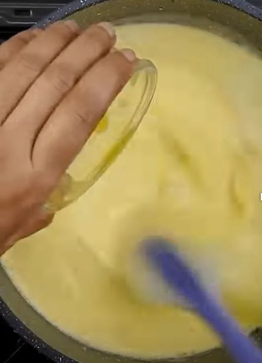 Step 1.1: Once the milk is warm (but not boiling), slowly add the custard paste while stirring constantly to avoid lumps