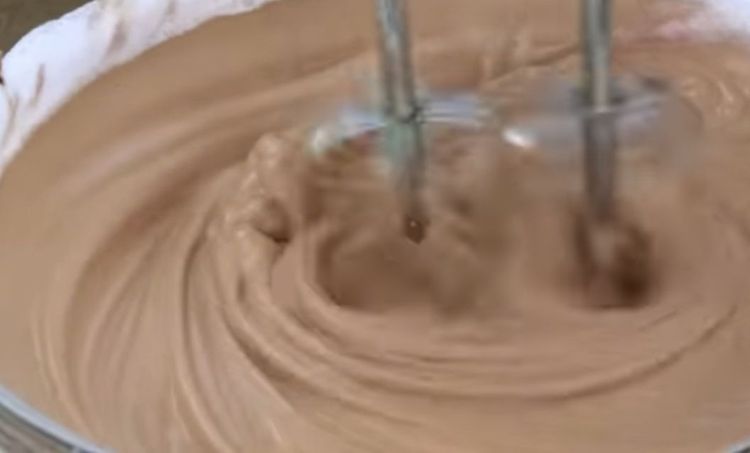 Step 1.2: Let the melted chocolate cool slightly (it should still be warm but not hot)