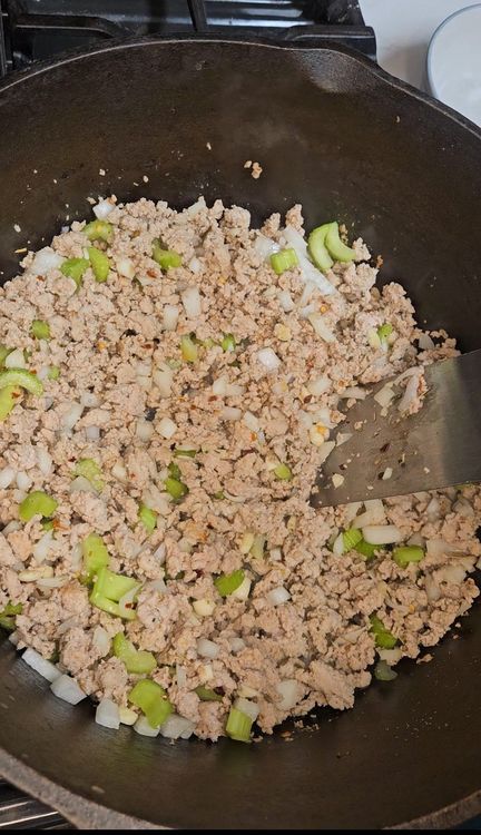 Step 2.1: Add the diced onion, celery, and minced garlic to the pot