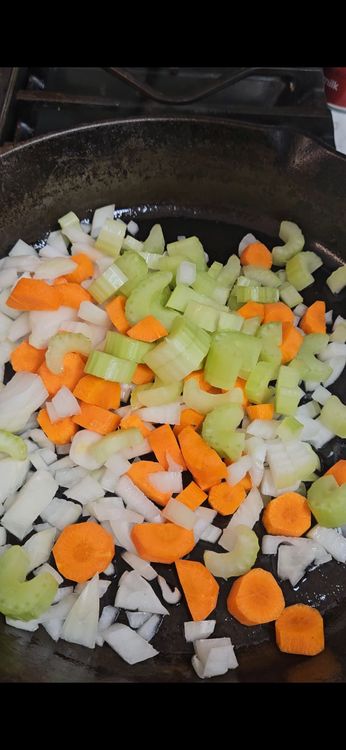 Step 2.1: Add oil, butter, or spray to a Dutch oven or large skillet on medium heat