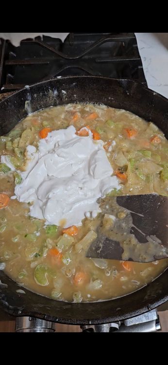 Step 2.2: Gradually whisk in the chicken bone broth and coconut milk until smooth