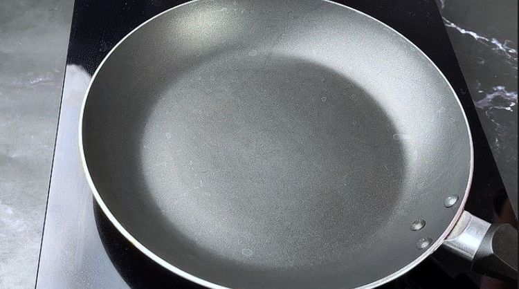 Step 2.1: In a pan, heat oil over low to medium flame