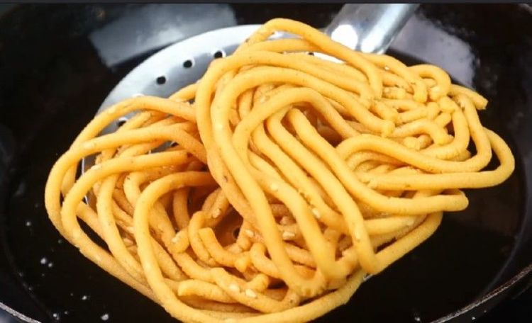 Step 4.1: Fry until golden brown and crispy, turning them occasionally for even cooking