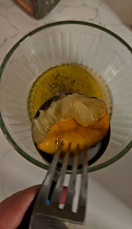 Step 4.1: Once veggies are done squeeze out the roasted lemon and mix with the olive oil, apple cider vinegar, salt, and pepper