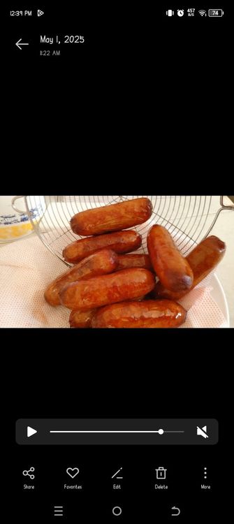 Step 1.3: Use tongs to remove the sausages from the oil and place them on a paper towel-lined plate to drain excess oil