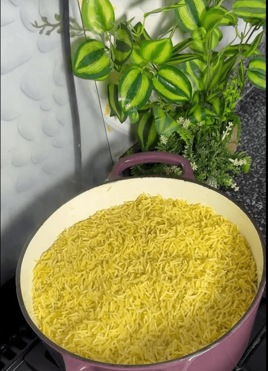 Step 2.3: Once the rice is cooked, add the mixed vegetables and stir well to combine
