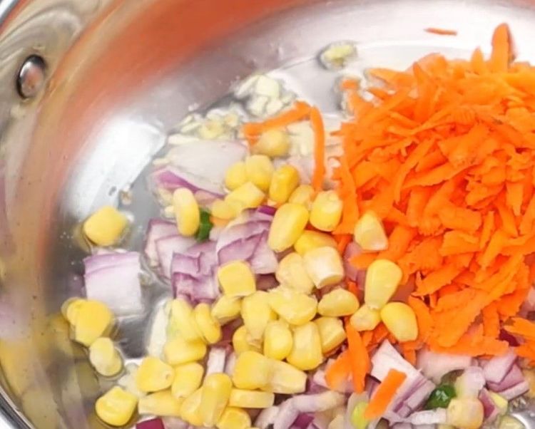 Step 2.3: Add finely chopped onion, carrot, sweet corn, green peas, and chopped beans