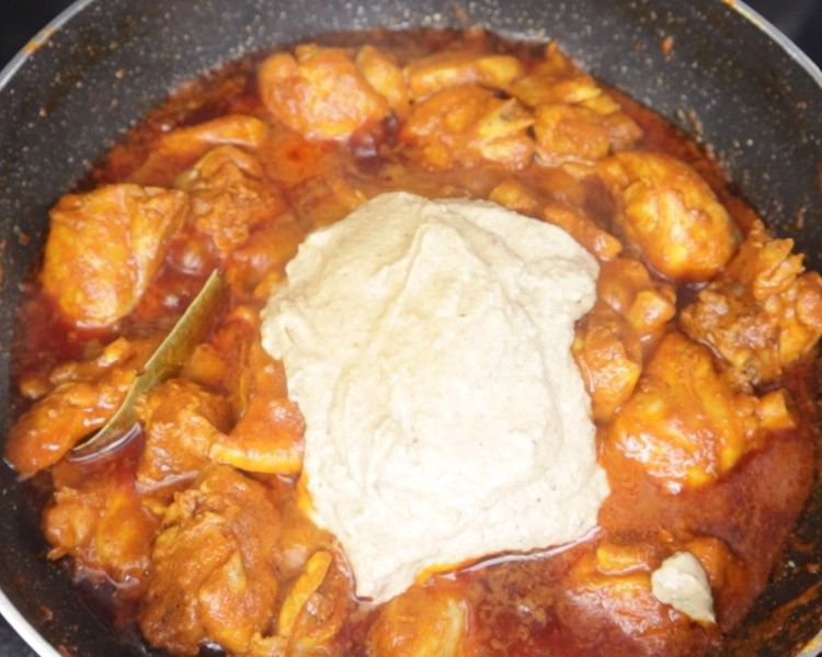 Step 4.1: Add the prepared onion-cashew-almond paste and slit green chillies