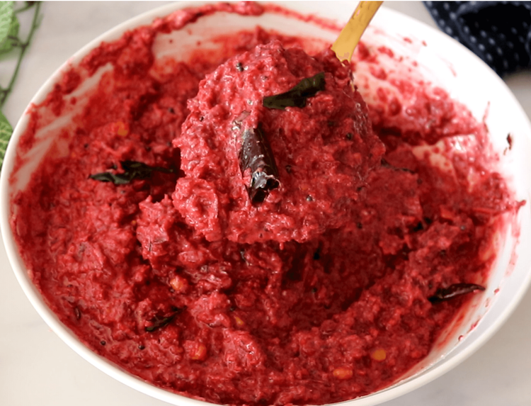 Step 3.2: Pour the tempering over the beetroot-yogurt mixture and mix gently