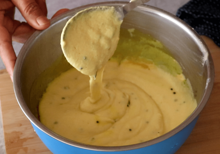 Step 2.1: Pour the tempering into the batter and mix gently
