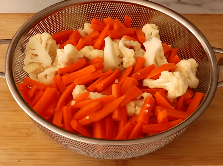 Step 2.1: Drain the vegetables immediately and spread them out on a clean cotton cloth or tray