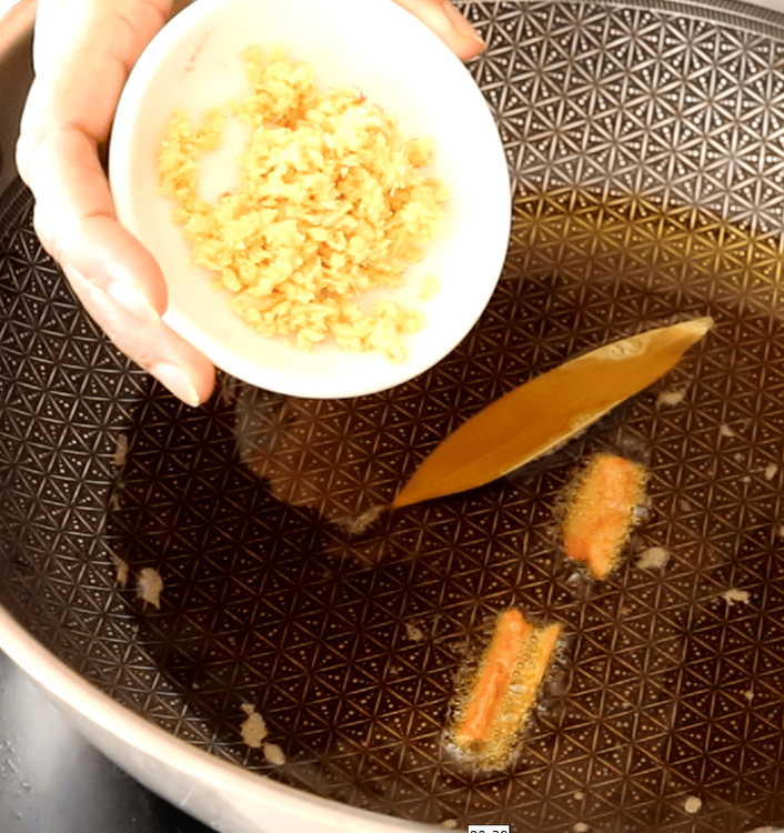 Step 3.1: Add finely chopped ginger and sauté briefly until aromatic