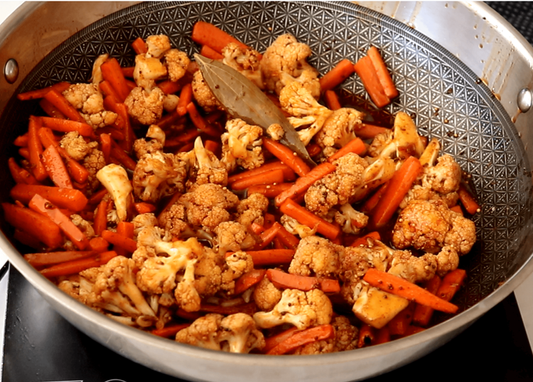 Step 5.1: Mix well to coat the vegetables evenly with the syrup