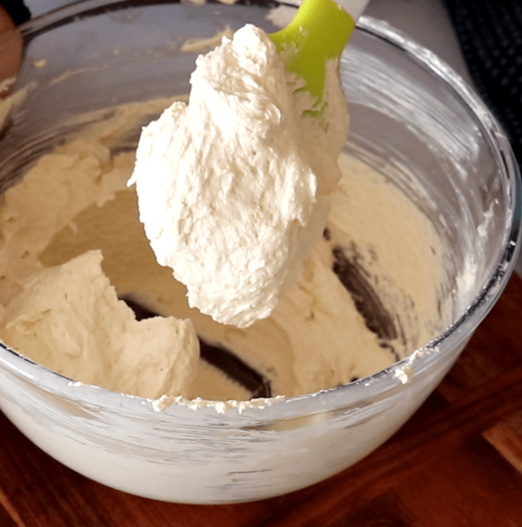 Step 1.2: Add the egg and vanilla extract to the butter-sugar mixture and whisk until the mixture becomes light and frothy