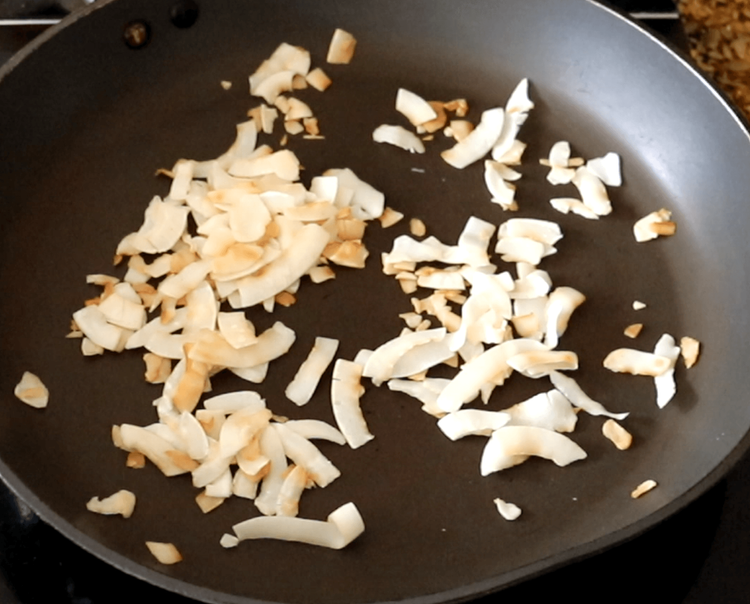 Step 3.1: Lastly, on low heat, dry roast the coconut flakes until they are lightly golden and fragrant